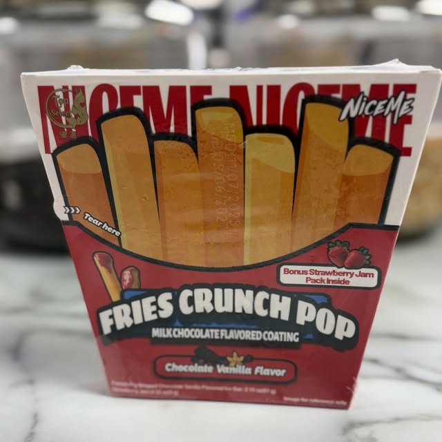 A boxed novelty ice cream treat, a chocolate-coated Fries Crunch Pop with a strawberry jam pack